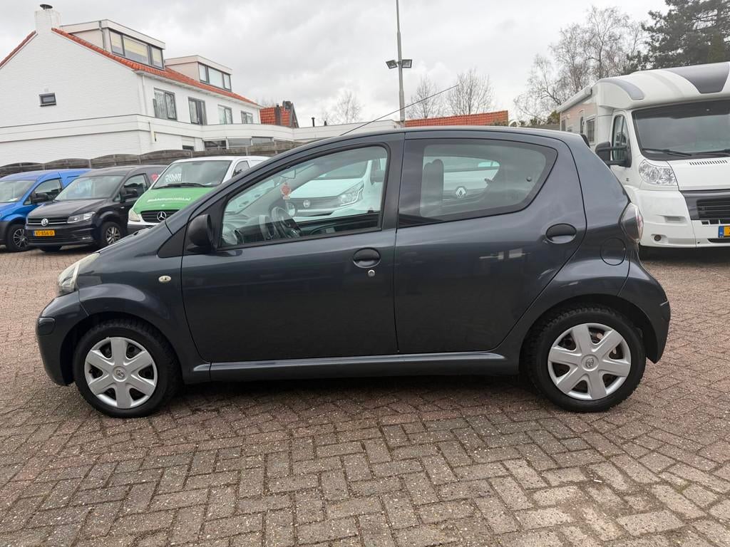 Toyota Aygo 1.0-12VComfort,5-DEURS,9-2010, Auto's, Voorwielaandrijving, Stof, Zwart, 4 stoelen