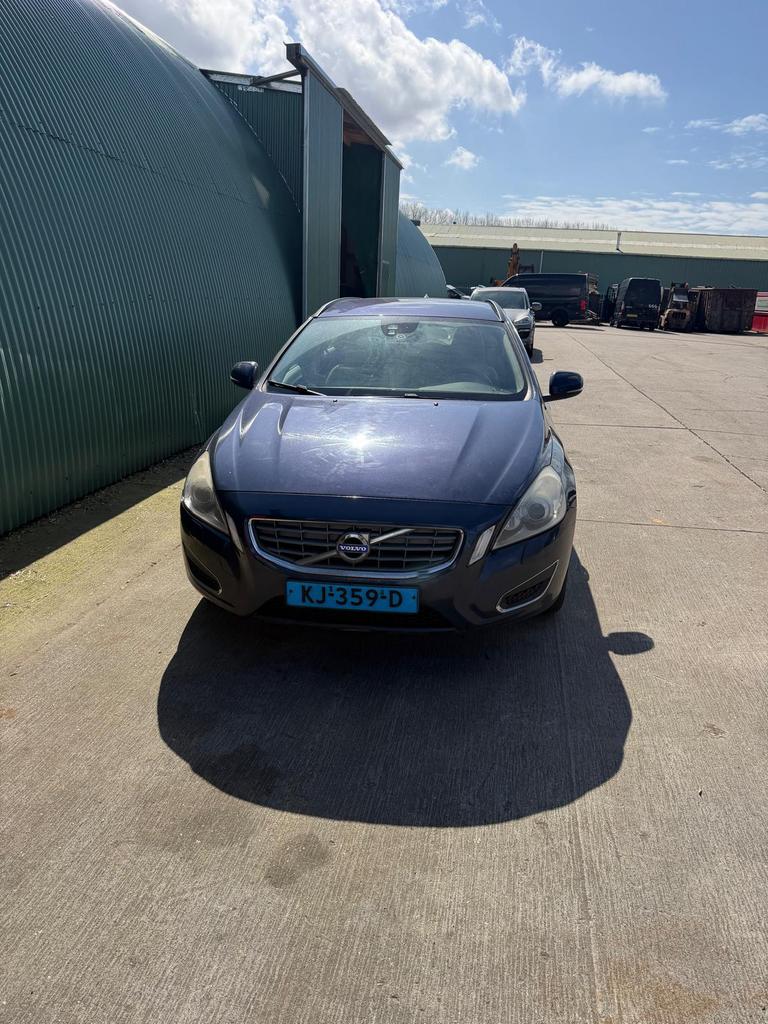 Volvo V60 Drive 1.6 D2, Auto's, Beige, 4 cilinders, Blauw, Leder