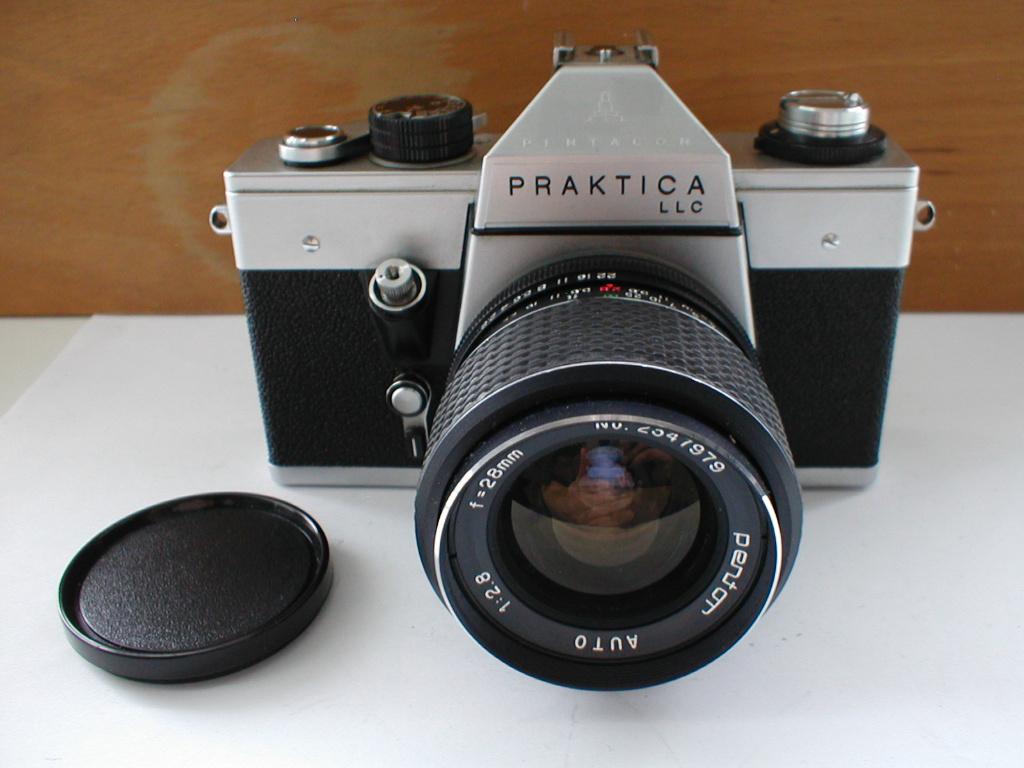 Praktica LLC reflexcamera met Pentor 28mm F/2.8 lens, Audio, Tv en Foto, Fotocamera's Analoog, Ophalen of Verzenden, Gebruikt