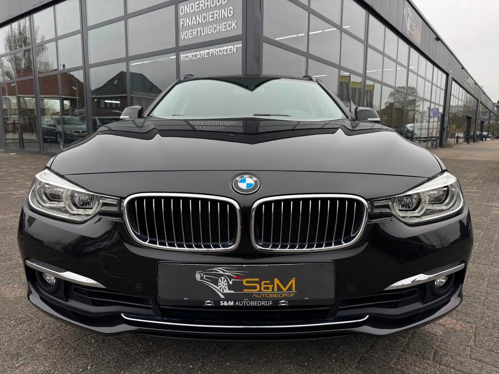 BMW 3-serie Touring 320i LED| panorama | Automaat, 1998 cc, Achterwielaandrijving, Gebruikt, Zwart