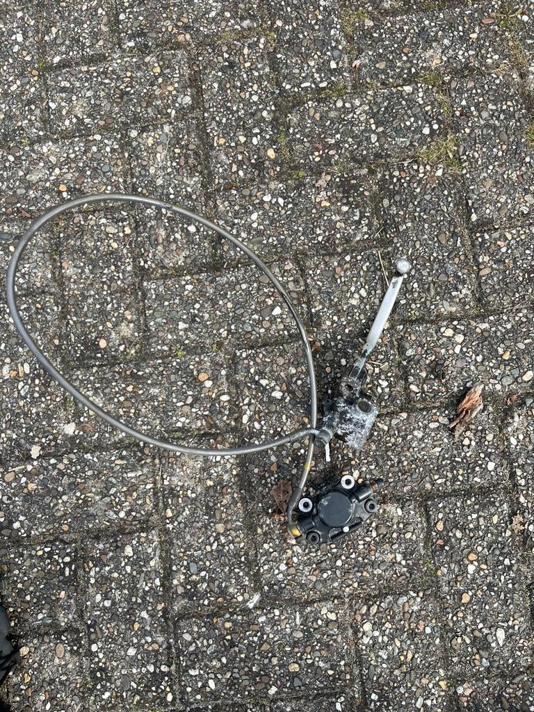 Piaggio zip 2000 voorrem stalen leiding, Ophalen of Verzenden