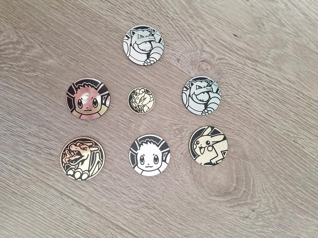 Pokemon verzamelmunten (7 stuks), Ophalen of Verzenden, Gebruikt