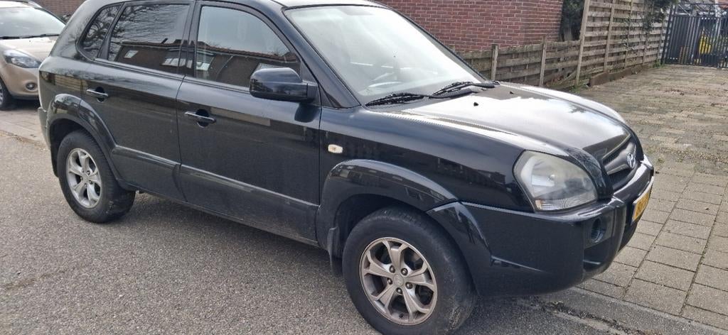 Hyundai Tucson 2.0 I 2WD 2009 Zwart, 4 cilinders, Zwart, Origineel Nederlands, 75 €/maand
