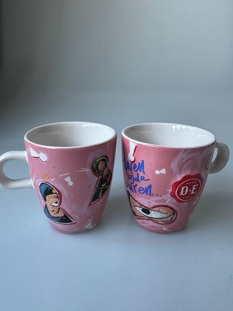 2 SENSEO MOKJES DE. Selwin Senatori "Gluren bij de buren", Ophalen of Verzenden, Zo goed als nieuw, Overige stijlen, Kop(pen) en/of Schotel(s)