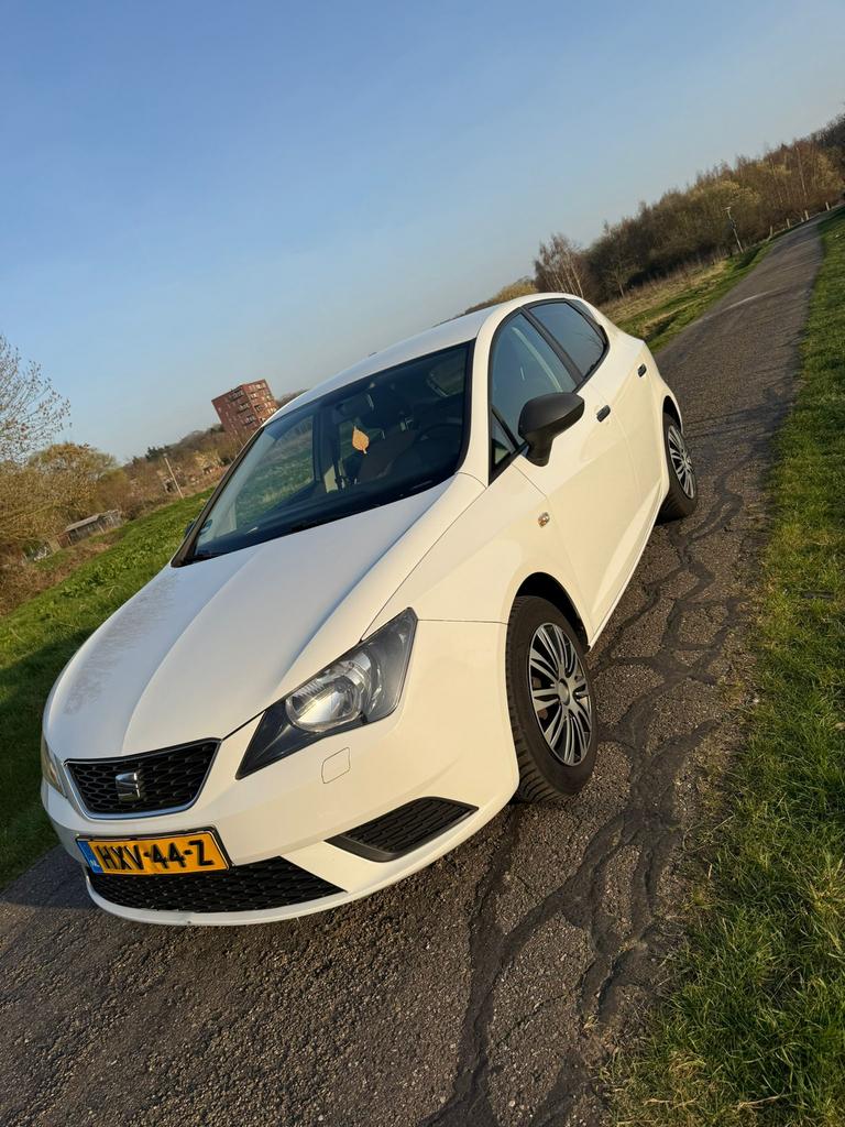 Seat Ibiza 1.2 51KW 5DRS 2015 Wit, Auto's, Voorwielaandrijving, Euro 5, Stof, Zwart