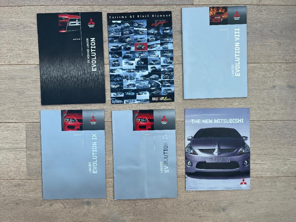 MITSUBISHI LANCER EVOLUTION FOLDERS, Ophalen of Verzenden, Gelezen, Mitsubishi