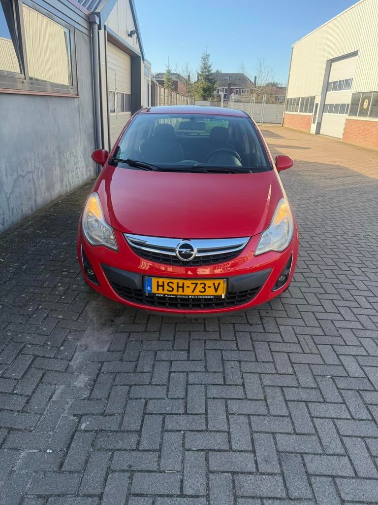 Opel Corsa 1.2 16V 5D 2011 Rood, Auto's, Voorwielaandrijving, Stof, Zwart, 4 cilinders