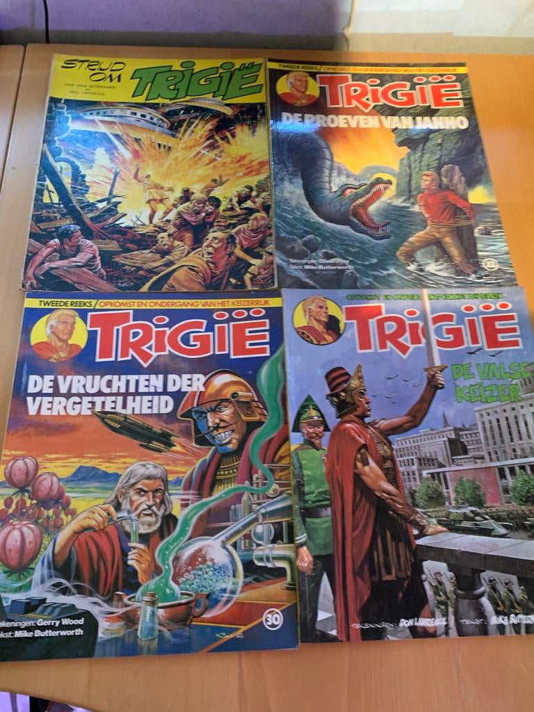 Trigie stripboeken - 19 stuks, Meerdere stripboeken, Ophalen of Verzenden, Gelezen