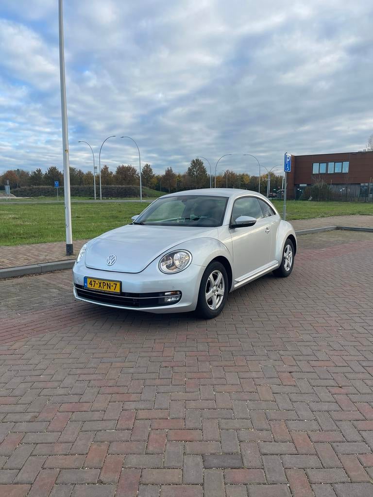 Volkswagen Beetle (Kever) 1.2 TSI 77KW BMT 2012 Grijs, Voorwielaandrijving, Stof, Beetle (Kever), 4 cilinders