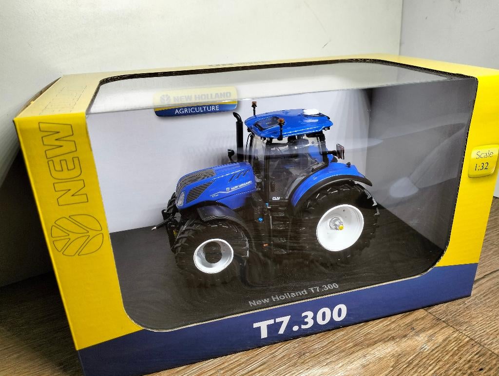 Te koop UH New Holland T7.300., Ophalen of Verzenden, Nieuw, Tractor of Landbouw, Universal Hobbies