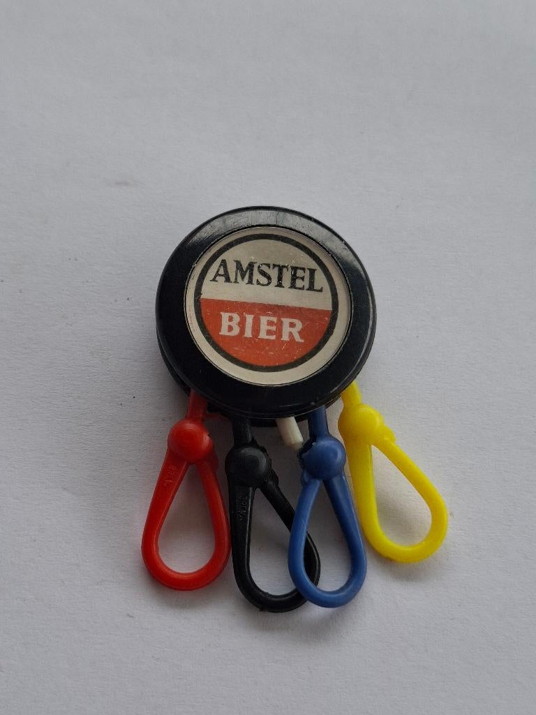 Sleutelhanger amstel bier, Ophalen