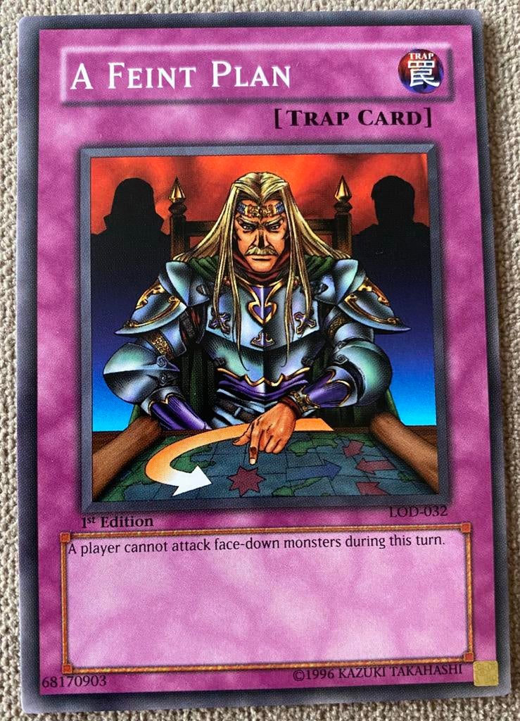 Yu-Gi-Oh! Misprint A Feint Plan LOD in 1st Edition M/NM !, Ophalen of Verzenden, Zo goed als nieuw, Losse kaart