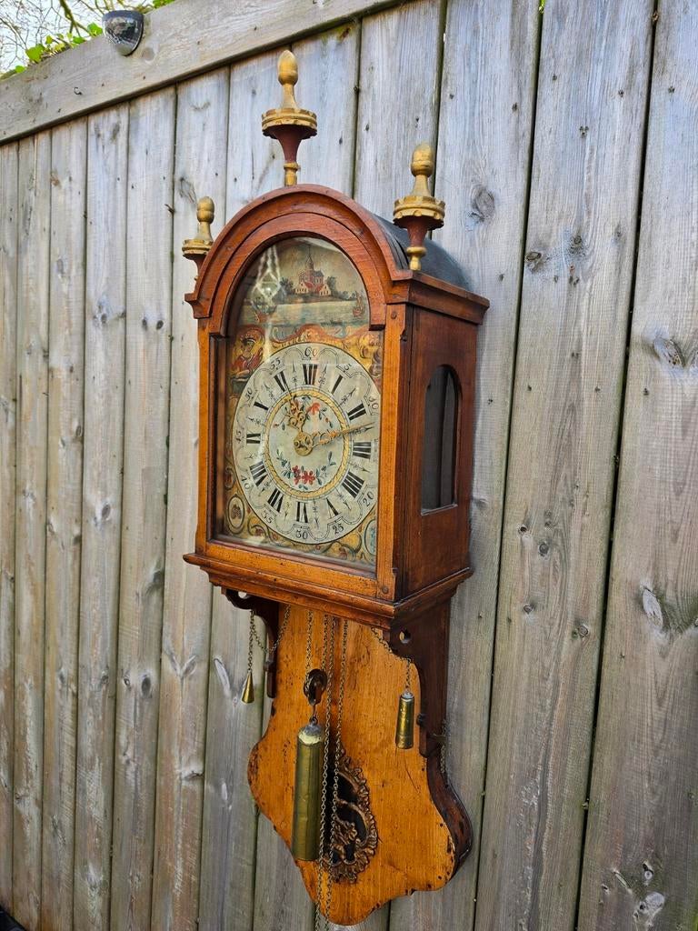 Antieke Friese kortstaart klok, Ophalen