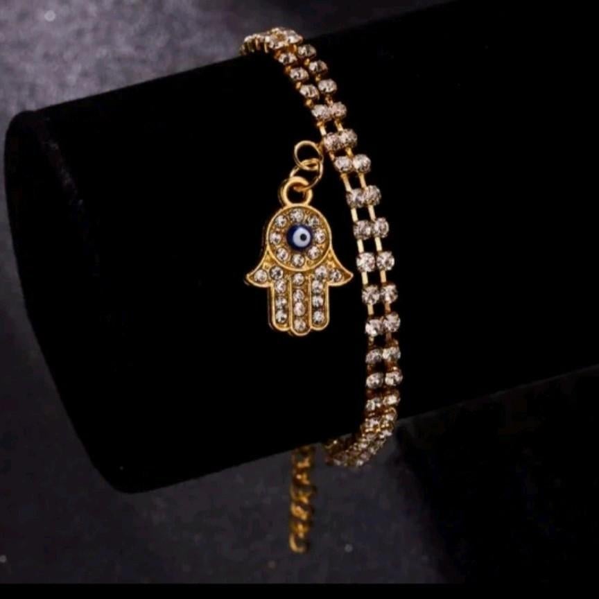 Gouden armband met Hamsa hand en strass steentjes, Overige materialen, Met bedels of kralen, Nieuw, Ophalen of Verzenden