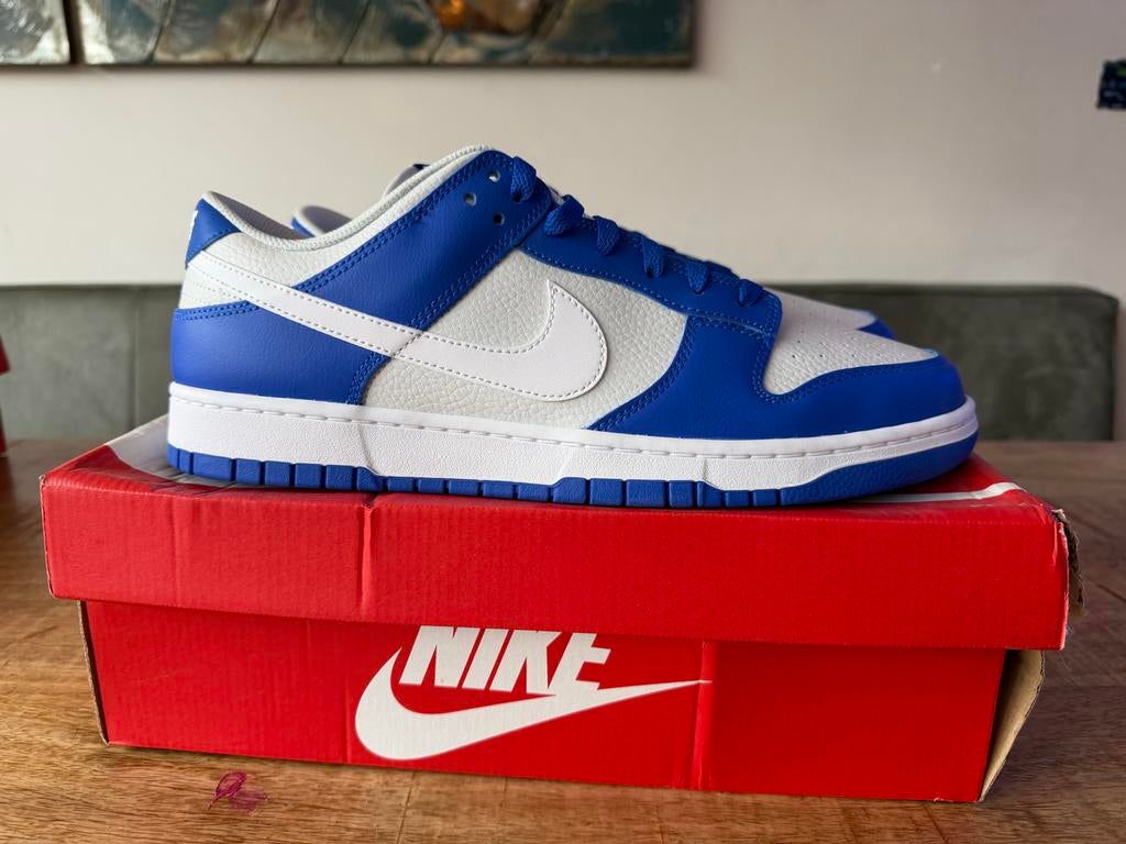 Nike Dunk Low Racer Blue Photon Dust. Maat 47.4, Kleding | Heren, Schoenen, Nieuw, Sneakers of Gympen, Blauw, Ophalen of Verzenden