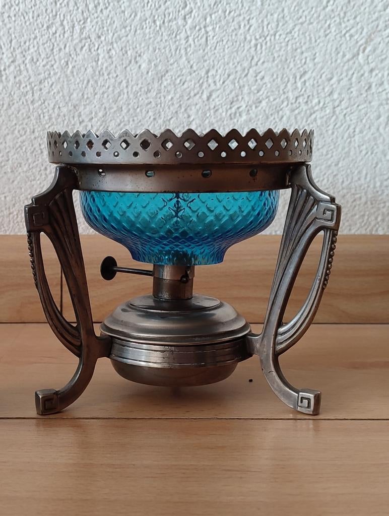 Antieke theepotverwarmer met blauw glas, Ophalen