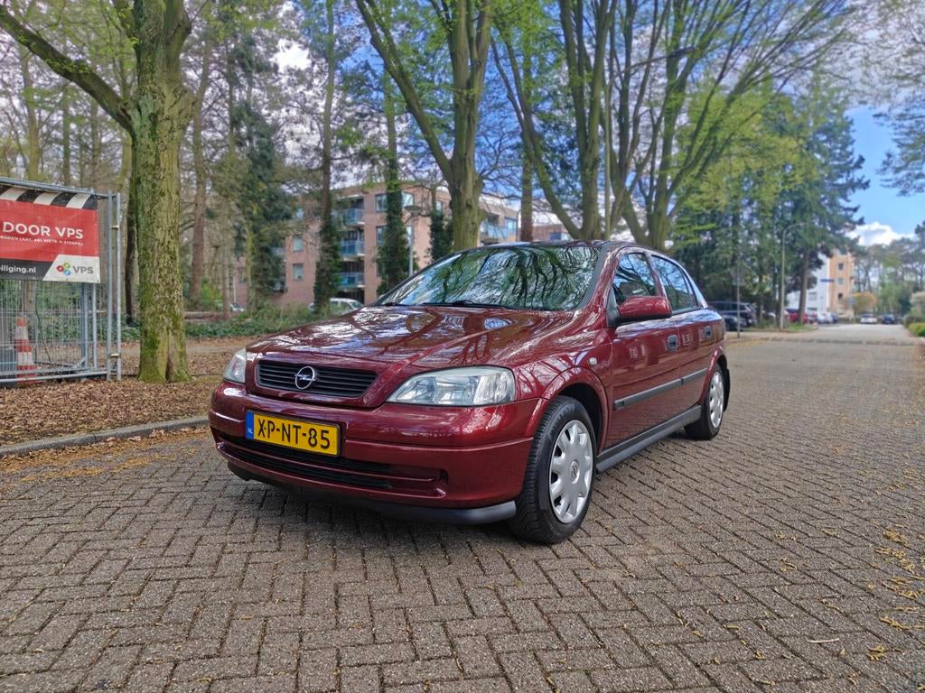 Opel Astra 1.6 I 1999 Rood - 195.500km, Auto's, Opel, 74 pk, 4 cilinders, 1055 kg, 49 €/maand