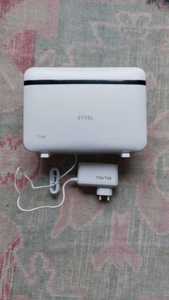 ZyXel DX5401 (T-54), Computers en Software, Routers en Modems, Ophalen of Verzenden, Zo goed als nieuw, Router met modem, Zyxel