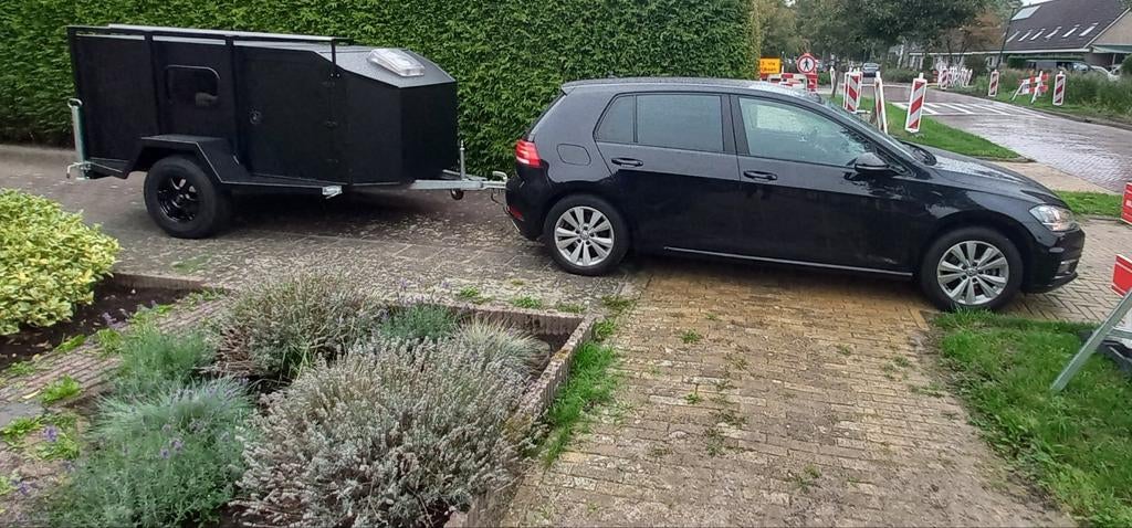 Compacte Mini Caravan, Ophalen