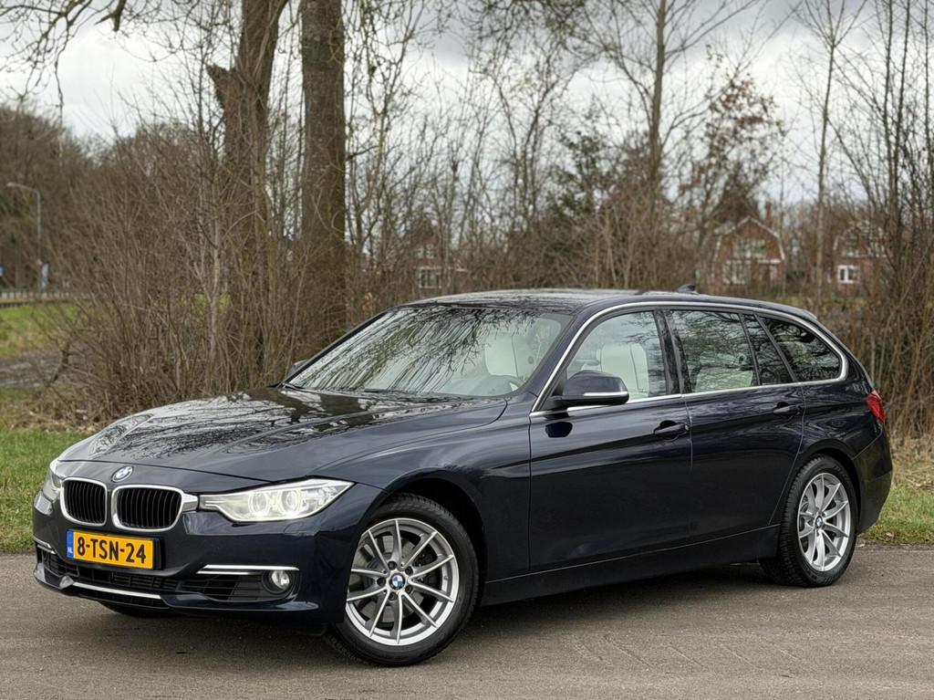 BMW 3-serie Touring 328i xDrive El Trekhaak/individueel, Auto's, Automaat, Euro 6, 4 cilinders, Navigatiesysteem