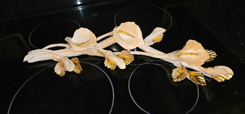 Porseleinen  bloementak, Ophalen