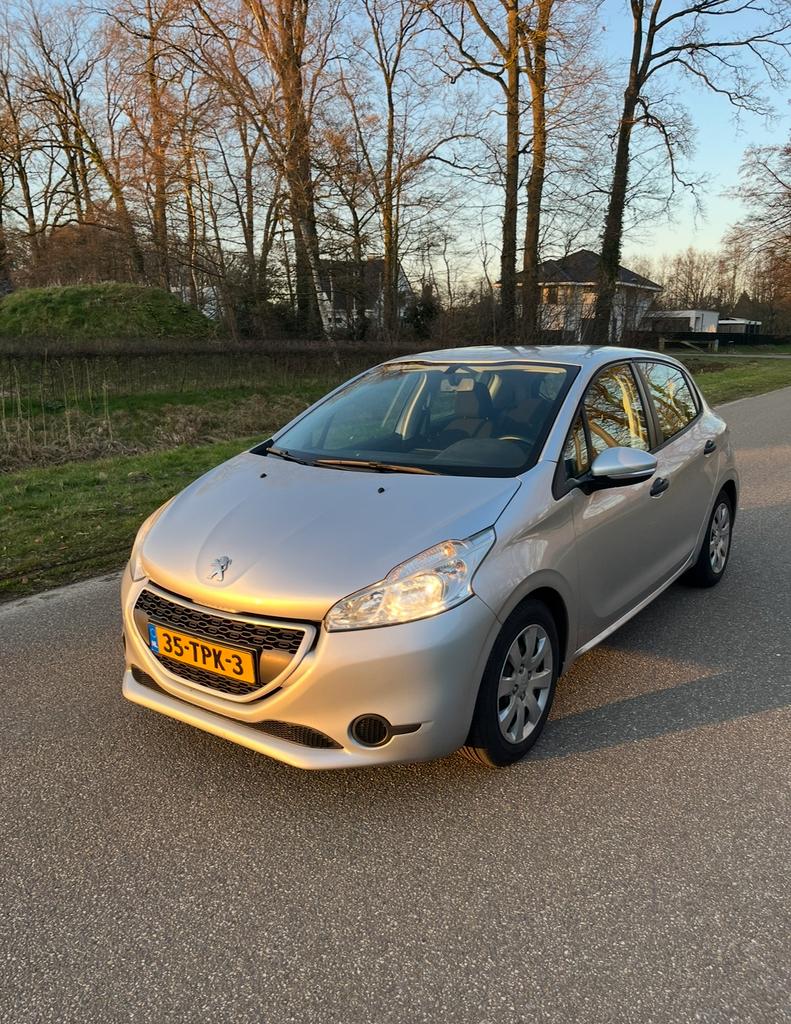 Peugeot 208 1.4 VTI/ Nieuwe Apk/ 70KW/95PK 5-D 2012 Grijs, Auto's, Peugeot, 40 €/maand, Origineel Nederlands, Handgeschakeld, Zilver of Grijs