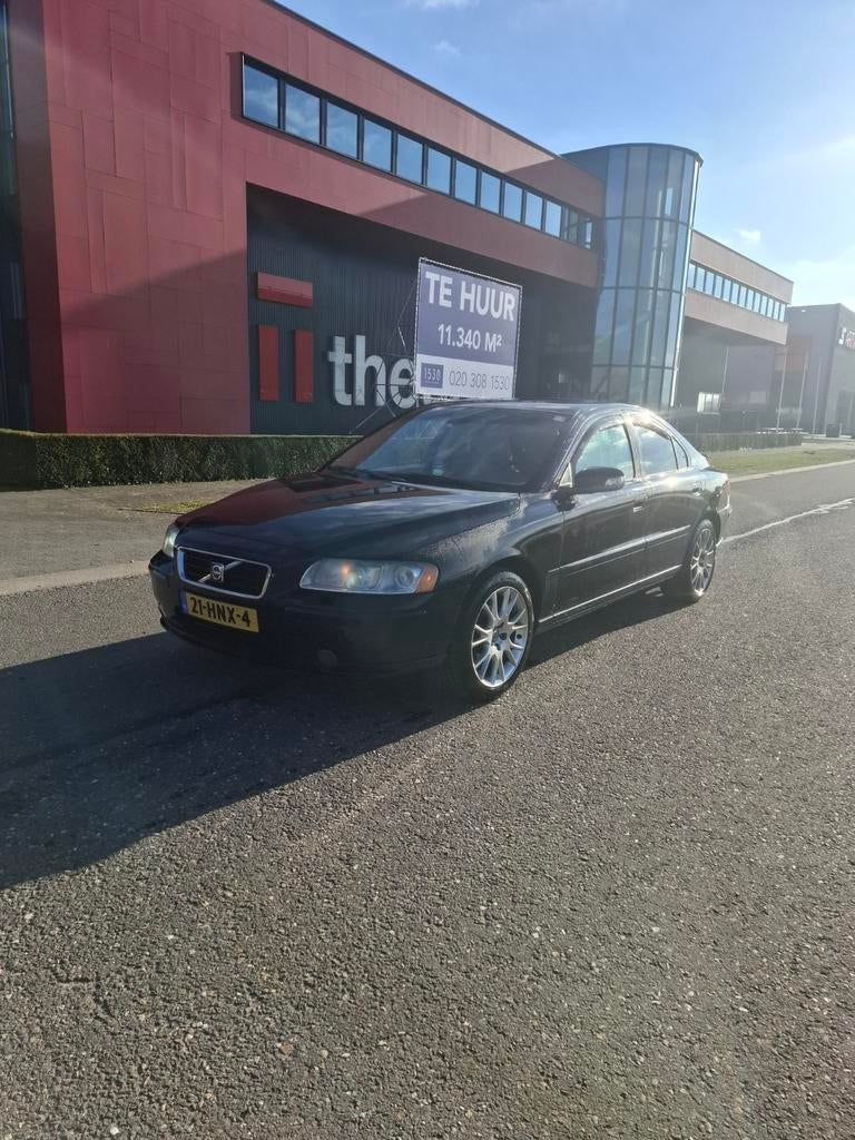 Volvo S60 2.4 140PK 2009 Donkerblauw, Auto's, Volvo, Voorwielaandrijving, Beige, Blauw, 75 €/maand
