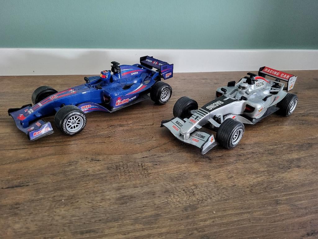 Formule 1 auto's. Met licht en geluid  1/18, Ophalen of Verzenden, Gebruikt