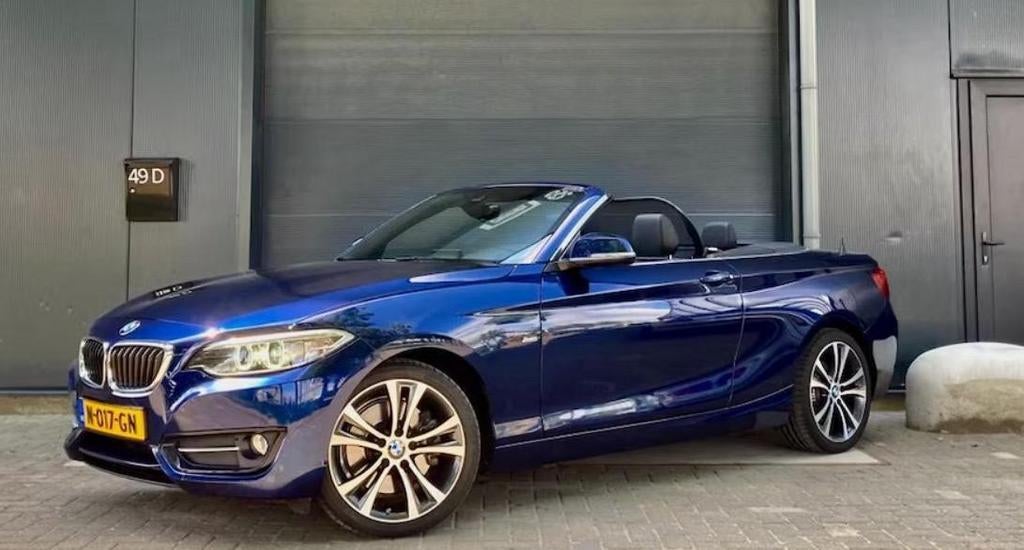 BMW 2-Serie 2.0 228I Cabrio AUT 2016 Blauw, Auto's, Automaat, Zwart, Cabriolet, Particulier
