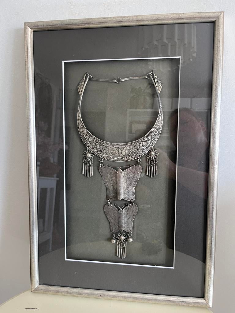 China Hmong  Miao Ketting, Ophalen