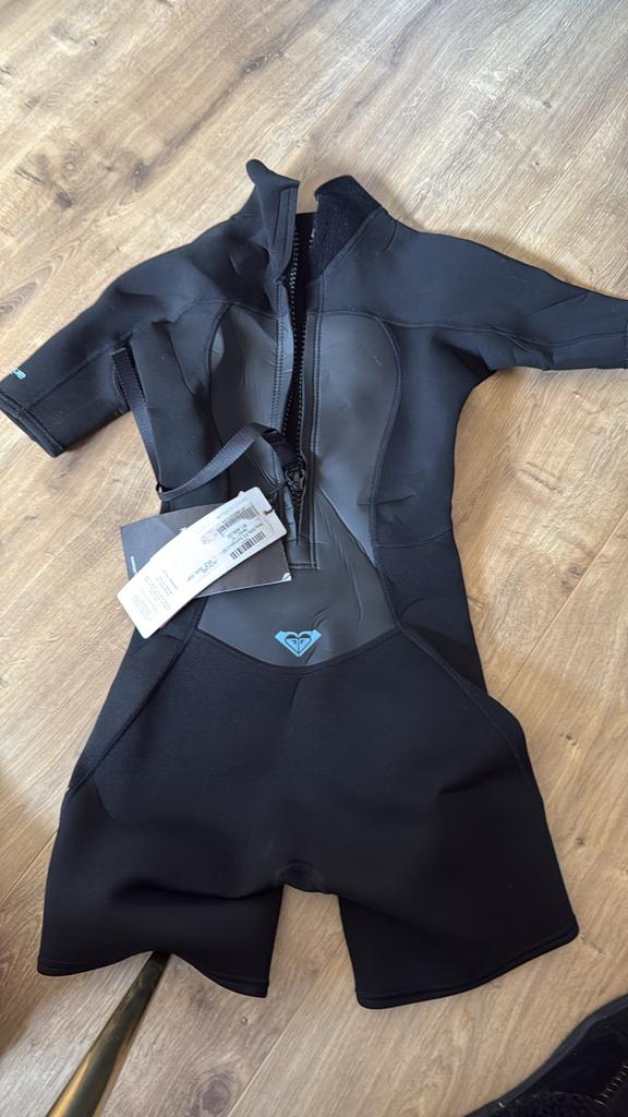 Nieuwe Roxy Shorty Wetsuit voor Meiden - Maat 12 Jaar, Watersport en Boten, Watersportkleding, Ophalen of Verzenden, Nieuw, Kind