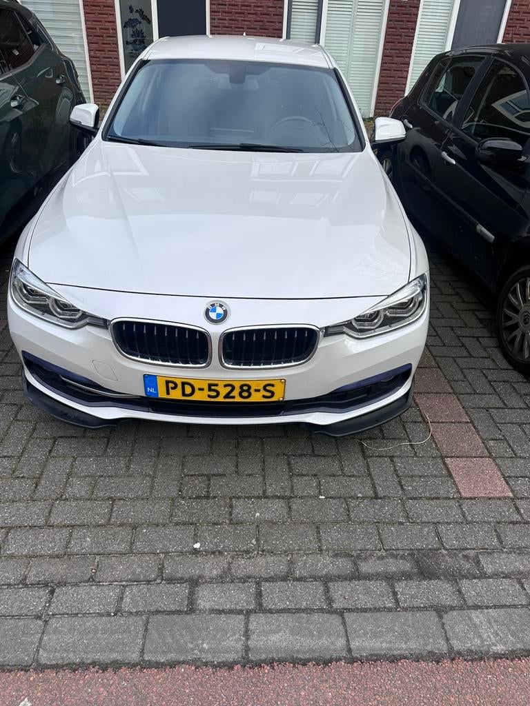 BMW 3-Serie 320i 184pk Aut 2017 Wit, Auto's, 1998 cc, Achterwielaandrijving, 1800 kg, 4 cilinders
