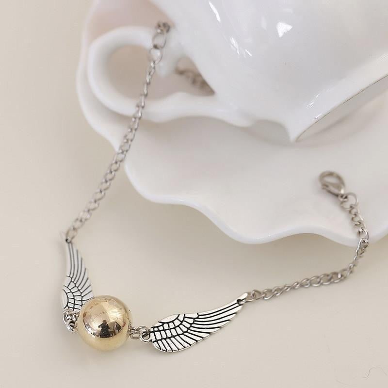 Harry Potter Armband Zwerkbal Gouden Snaai, Verzamelen, Harry Potter, Nieuw, Replica, Ophalen of Verzenden