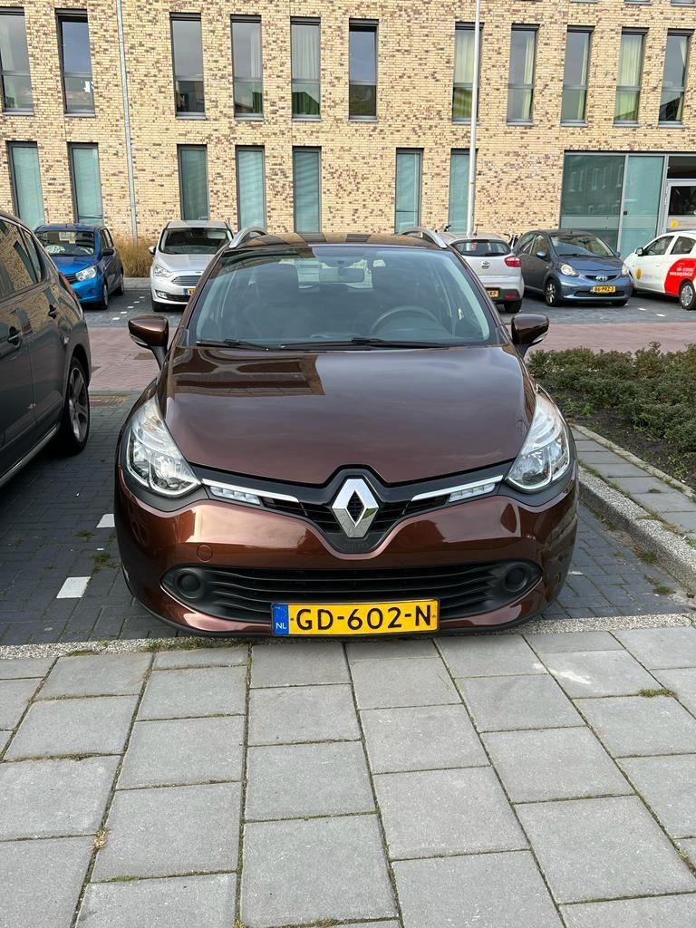 Renault Clio 1.5 DCI 66KW Estate 2015 Bruin, Auto's, Voorwielaandrijving, 4 cilinders, Bruin, 1096 kg