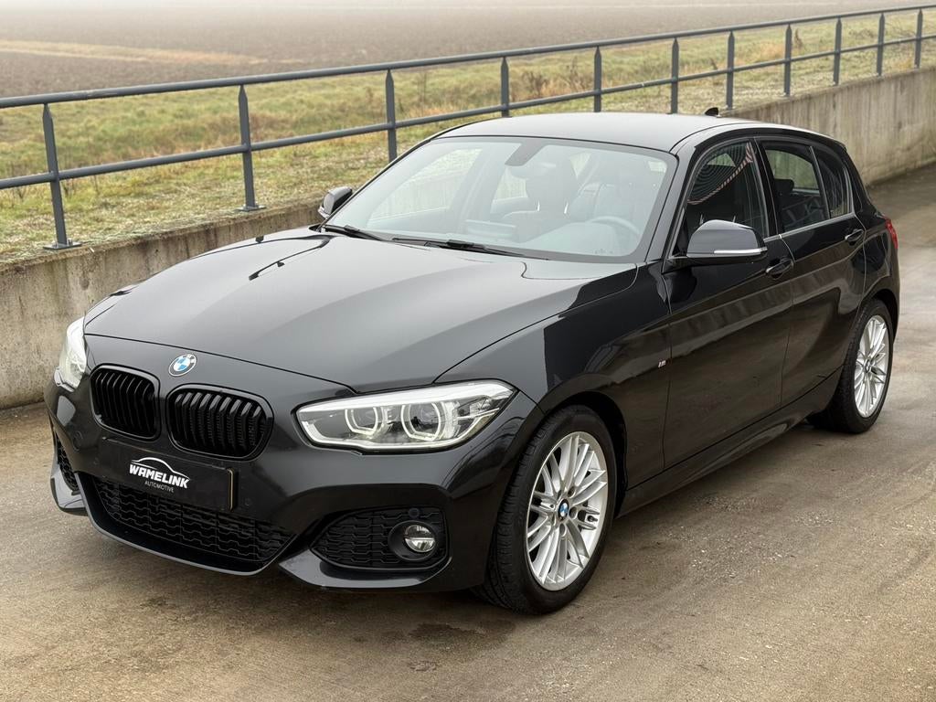 BMW 1-Serie 118i 136pk Aut 2018 NAP✅ Zwart, Stoelverwarming, Zwart, Bedrijf, 650 kg
