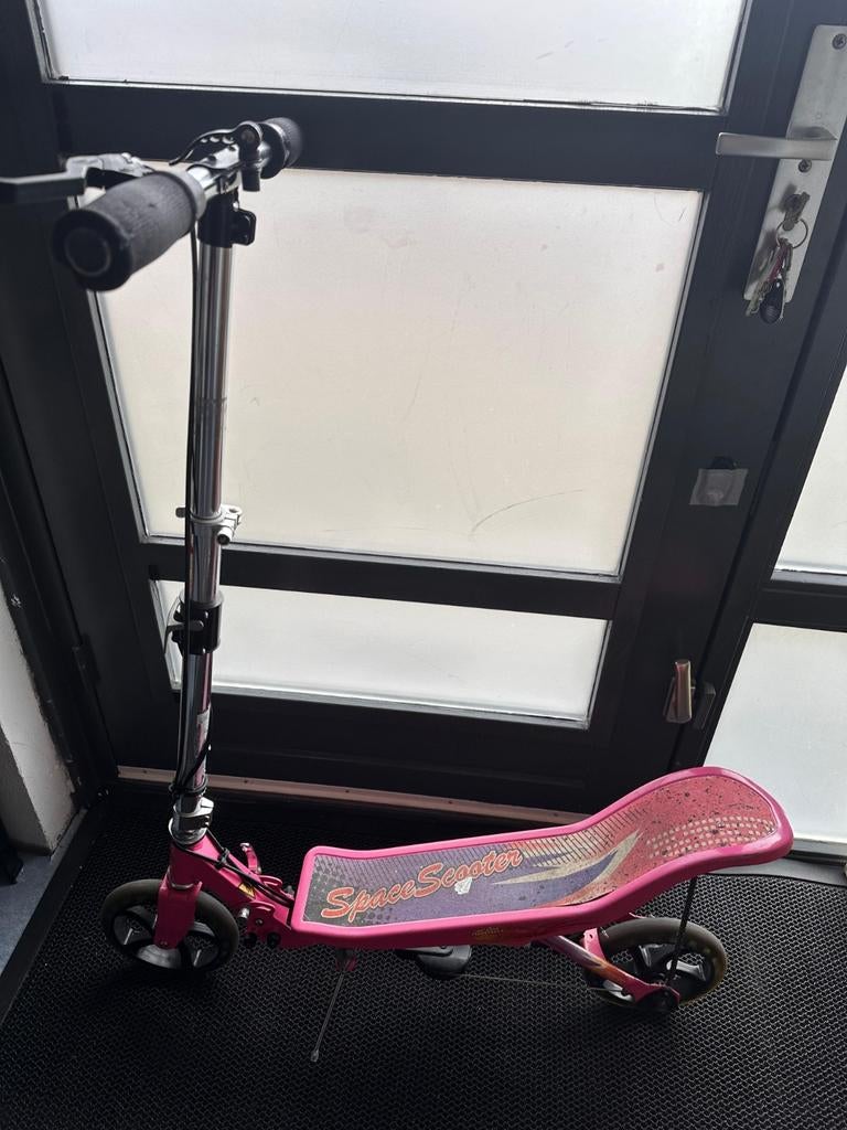 Space Scooter roze, Ophalen
