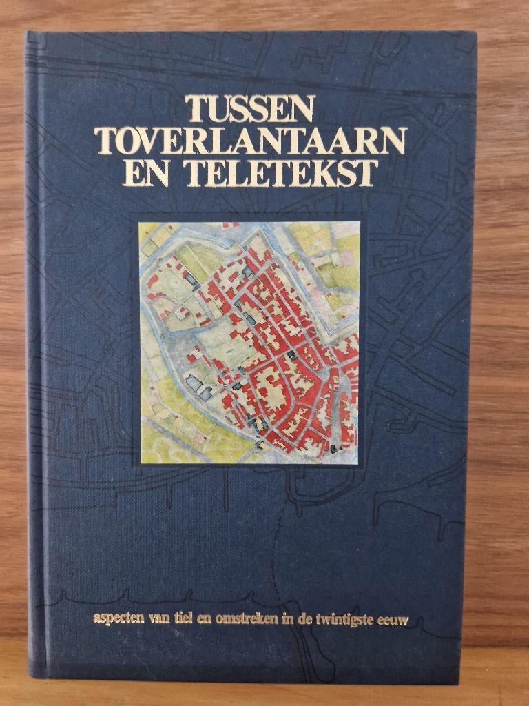 Tussen toverlantaarn en teletekst - over Tiel, Ophalen of Verzenden, Zo goed als nieuw, Smit Dr E.