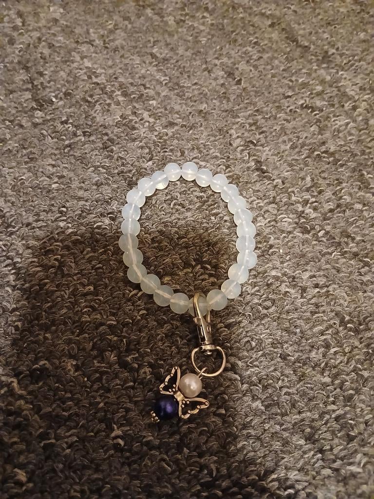 Blauw en wit horloge met vlinder, Ophalen of Verzenden