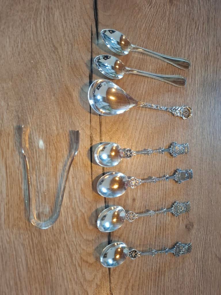 Diverse lepeltjes en suikerknijper, Ophalen