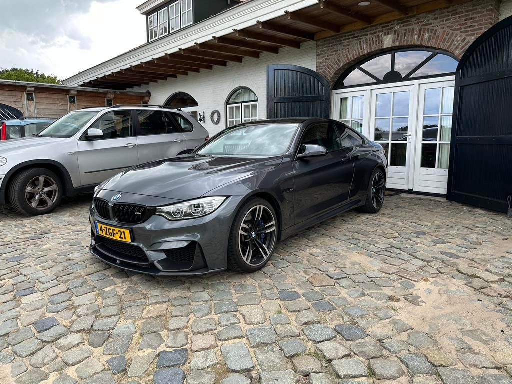BMW 4-Serie 3.0 M4 Coupe AUT 2015 Grijs, Auto's, BMW, Automaat, 431 pk, Zwart, 4-Serie