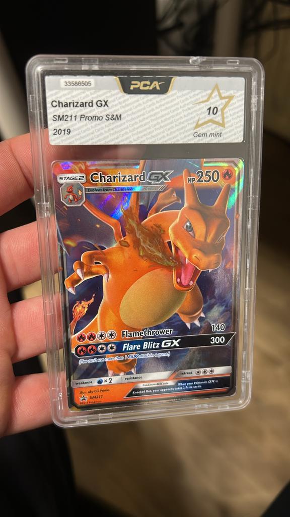 Charizard GX SM211 Promo S&M PCA 10, Ophalen of Verzenden, Zo goed als nieuw, Losse kaart, Foil