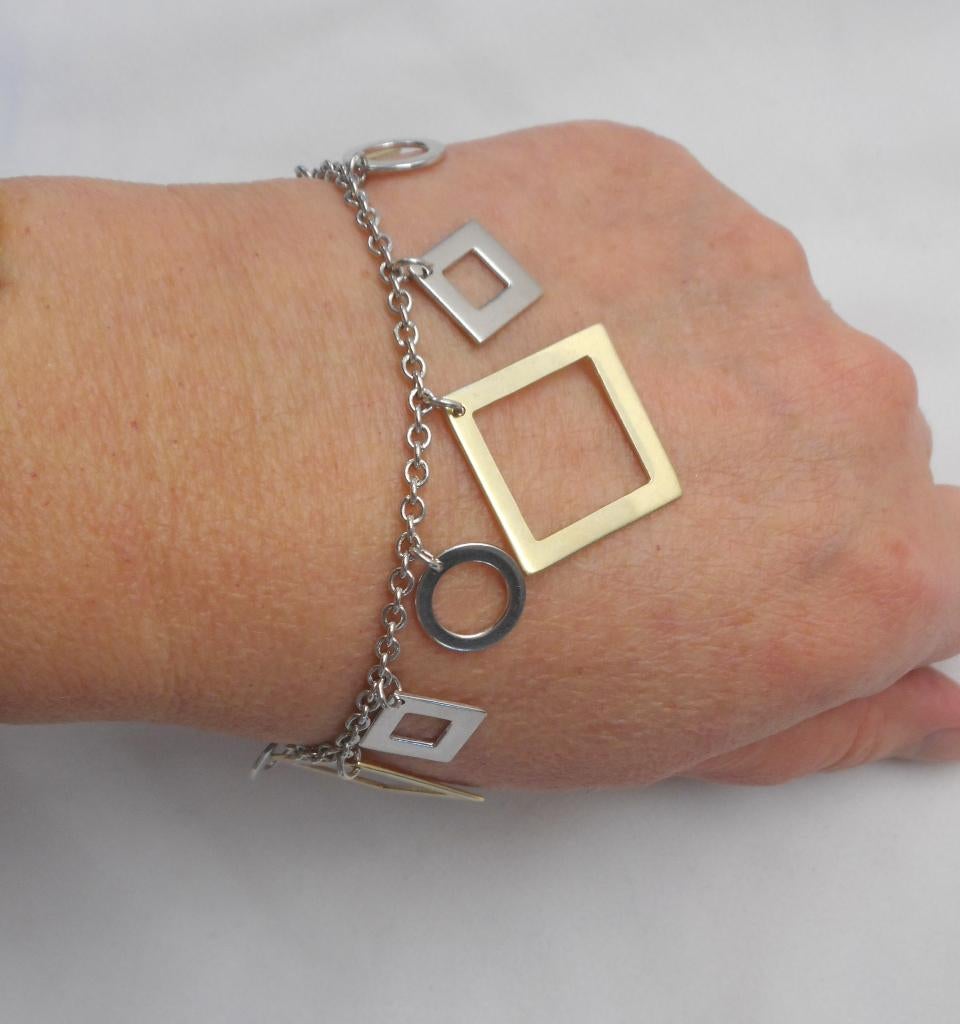 Zilveren verstelbare armband met bicolor bedels nr.258