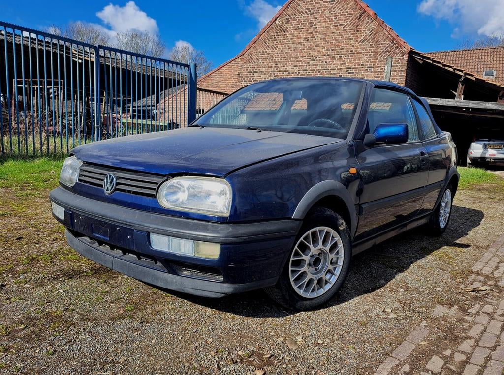 Volkswagen Golf 1.8 Cabriolet 55KW E2 1994 Blauw, Auto's, Volkswagen, Voorwielaandrijving, Stof, 74 pk, Zwart