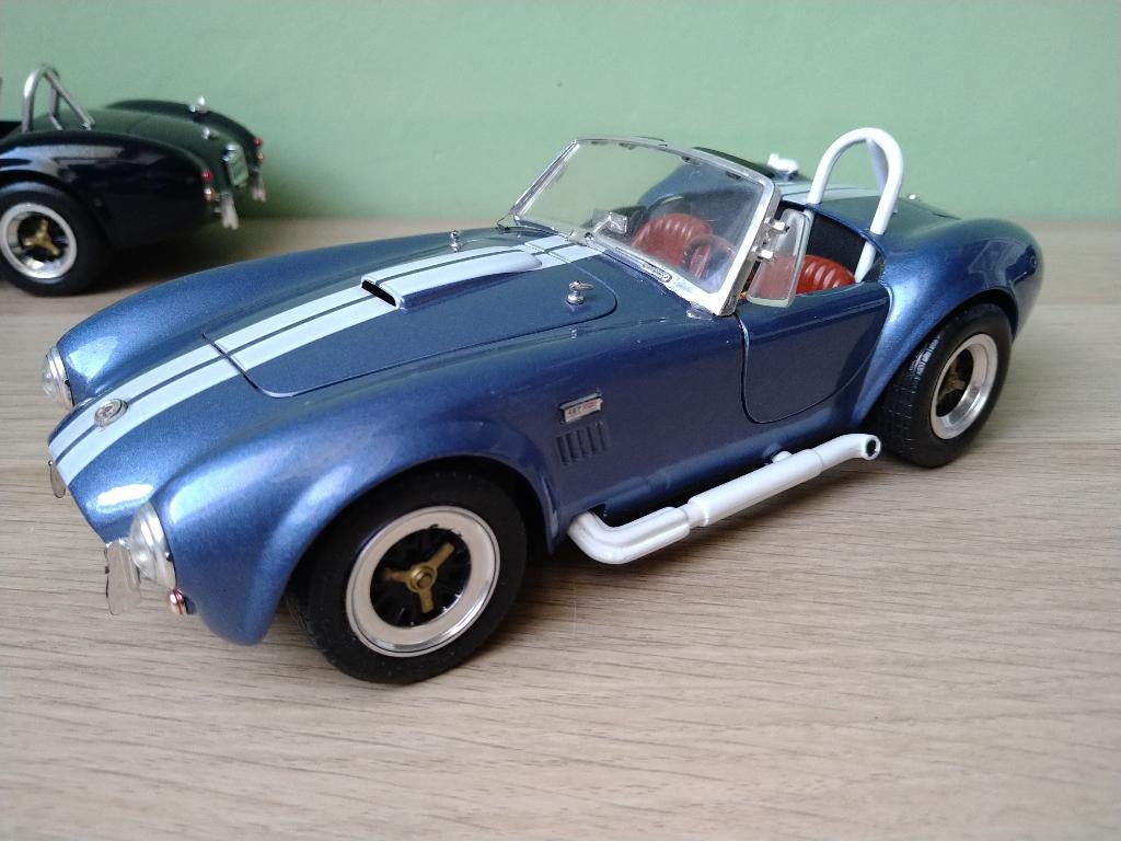Shelby Cobra 427 SC 1965 Custom Road Tough 1:18, Ophalen of Verzenden, Zo goed als nieuw, Auto, Overige merken