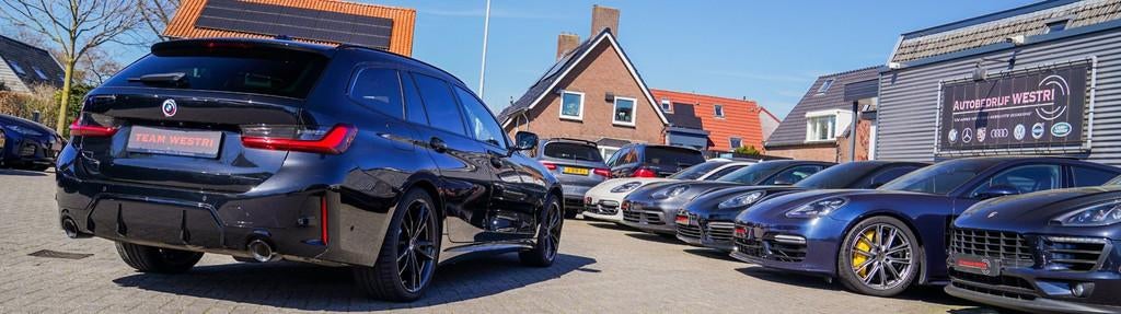 BMW 3-serie Touring 330e xDrive | Head Up Display | M Sports, 1998 cc, Gebruikt, 4 cilinders, Zwart