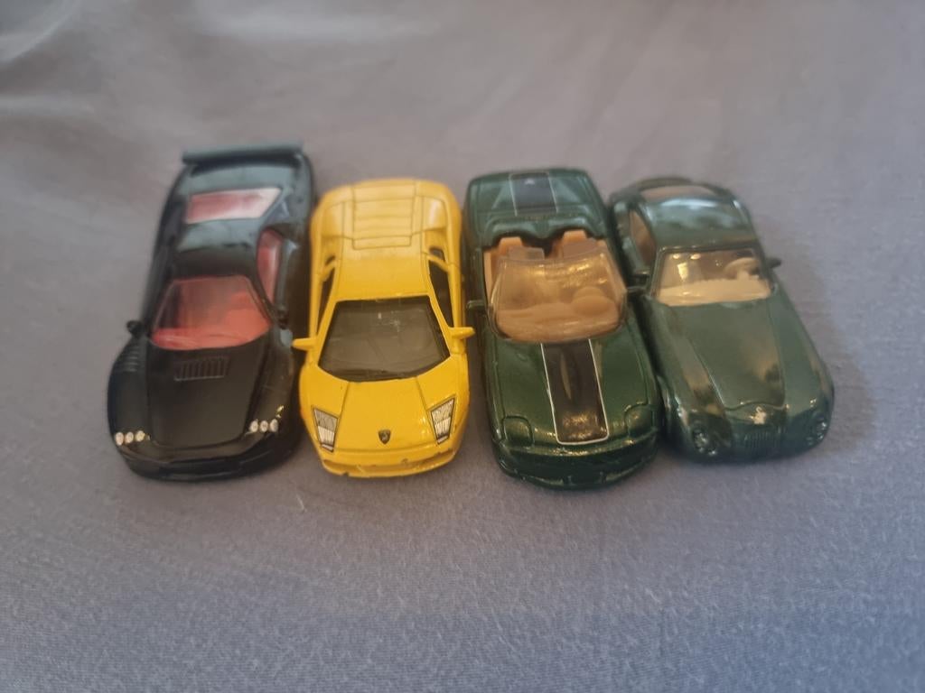 4 autos klein div merken, Verzenden, Zo goed als nieuw, Auto