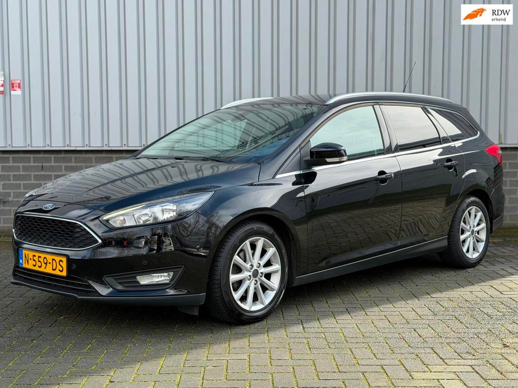Ford Focus Wagon 1.0 Titanium |Navi|CruiseCtrl|PDC|Stuur/Sto, Auto's, Gebruikt, Zwart, Handgeschakeld, 1216 kg