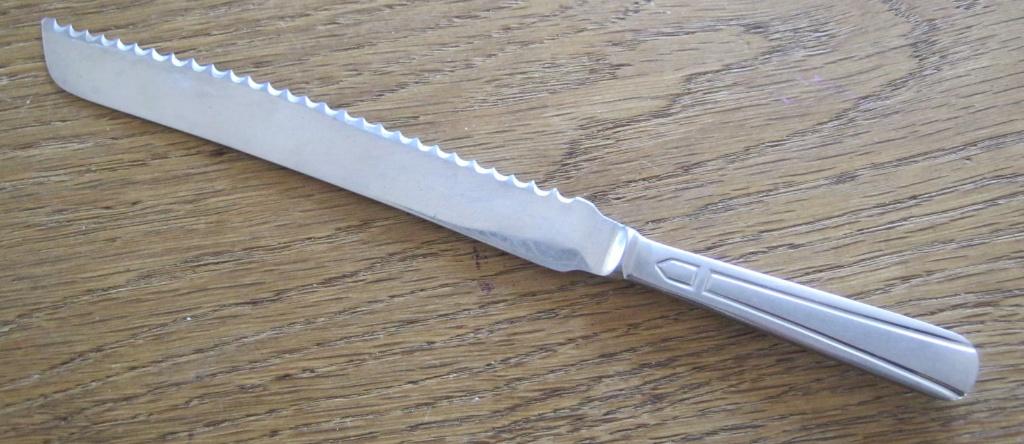 Broodmes, Ophalen of Verzenden, Zo goed als nieuw