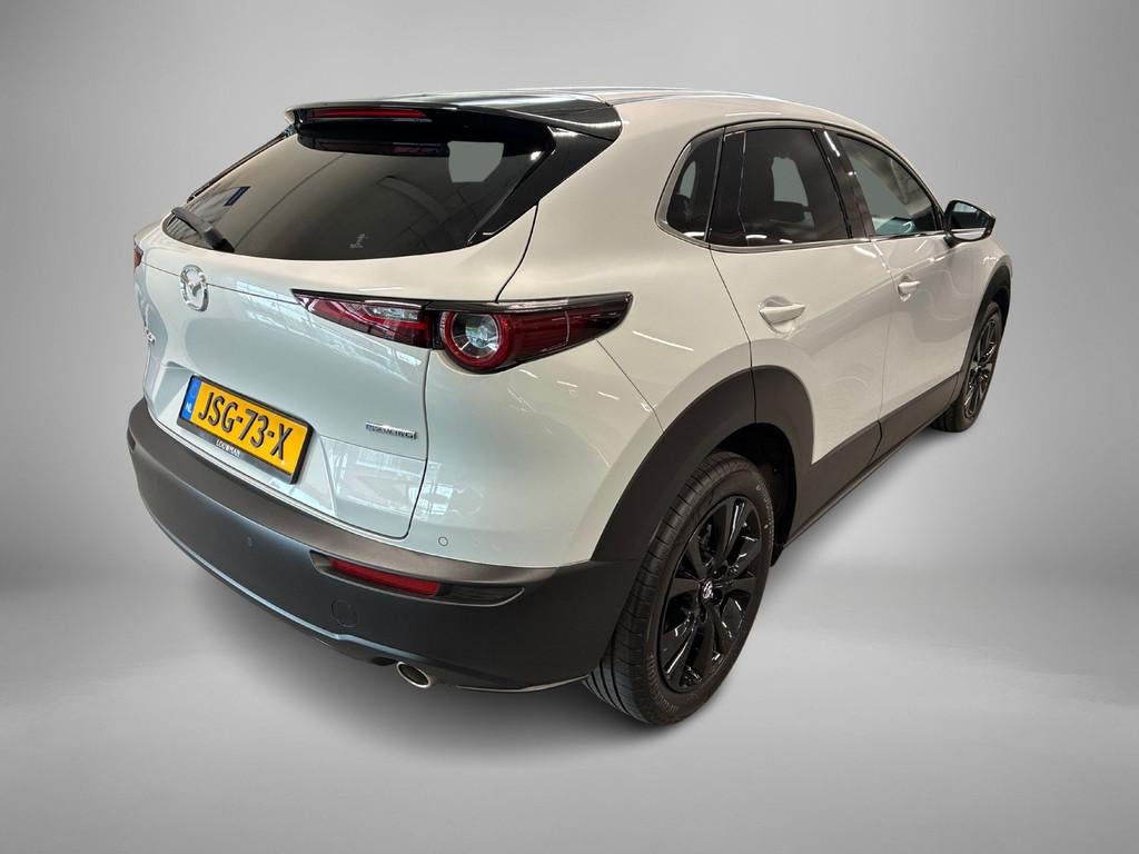Mazda CX-30 2.5 e-SkyActiv-G M Hybrid Homura (bj 2025), 12 maanden, Stof, 4 cilinders, Wit