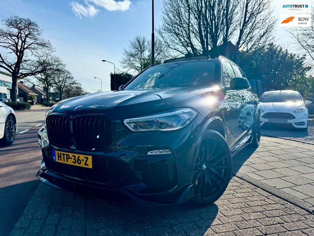 BMW X5 XDrive45e M-Performance Laser 22” Skylounge, Auto's, Gebruikt, Blauw, Vierwielaandrijving, Hybride Elektrisch/Benzine